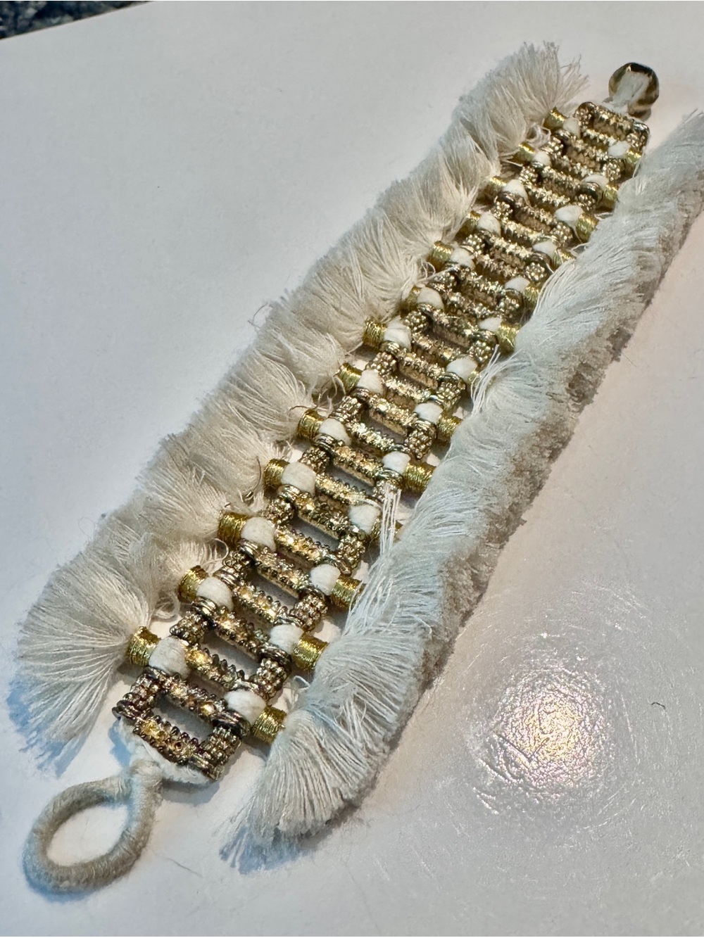 BudhaGirl Gold & Cream Boho Fringe Statement Bracelet